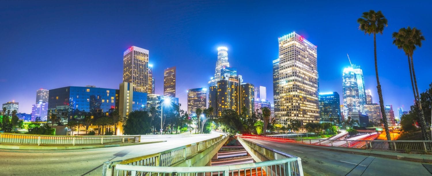 long exposure photography of vehicles on freeway in night
