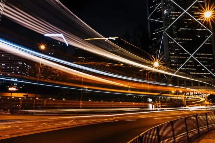 long exposure photography of vehicles on freeway in night