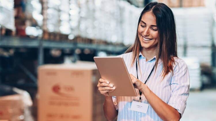 warehouse team member working with tablet